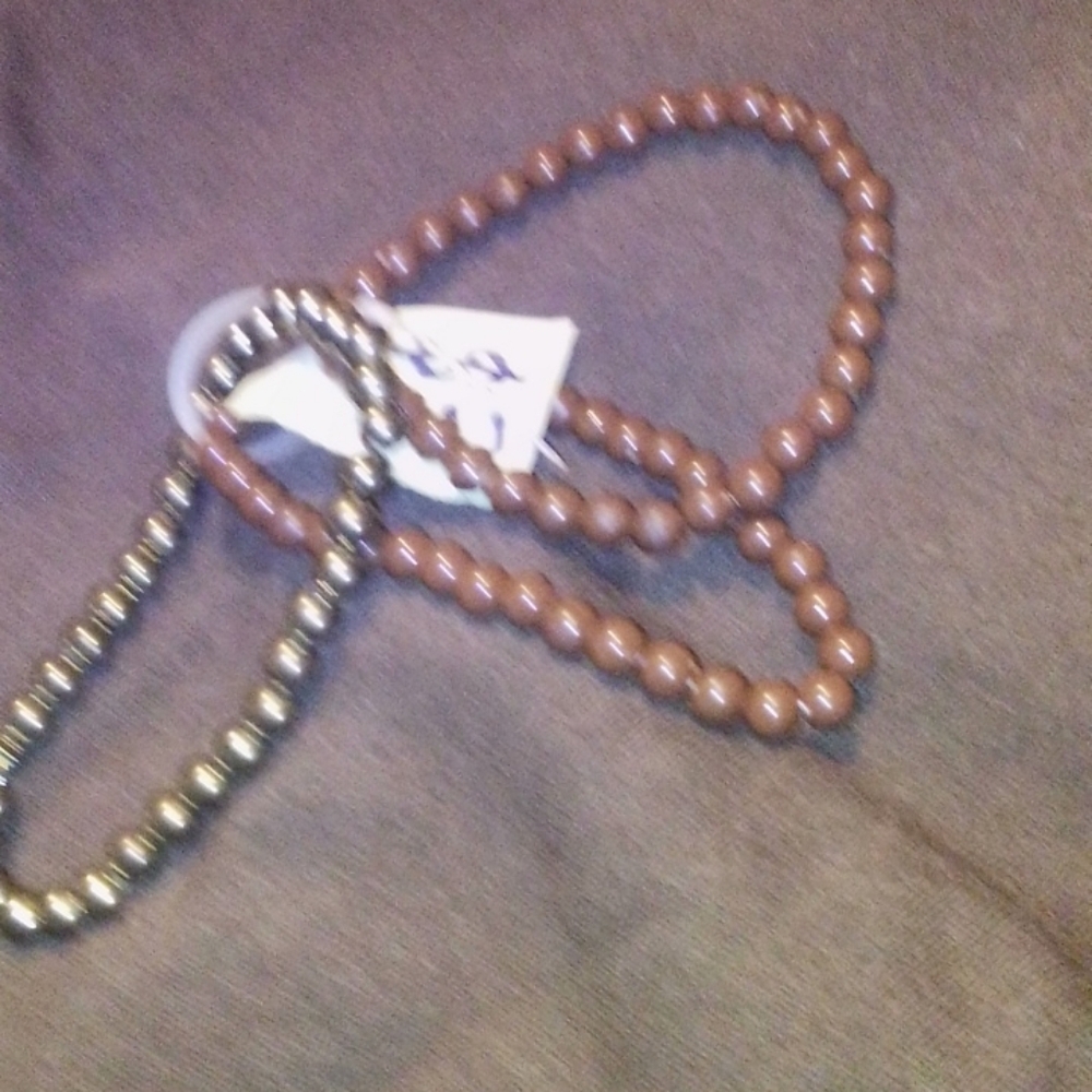 2 brown bracelets ,1 gold. Lot of 3